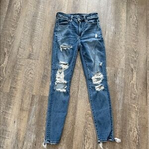 American Eagle Outfitters Ripped Blue Skinny Super Stretch Jeans